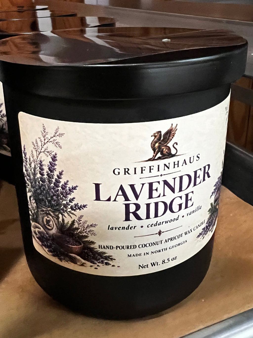 GriffinHaus Lavender Ridge 8.5 oz hand-poured apricot coconut wax candle in a black jar