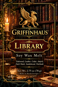 Griffinhaus Library Soy Wax Melt packaging design featuring a golden griffin logo, ornate gold and red lettering, and a background depicting a cozy, dimly lit library with leather-bound books and a burning candle.